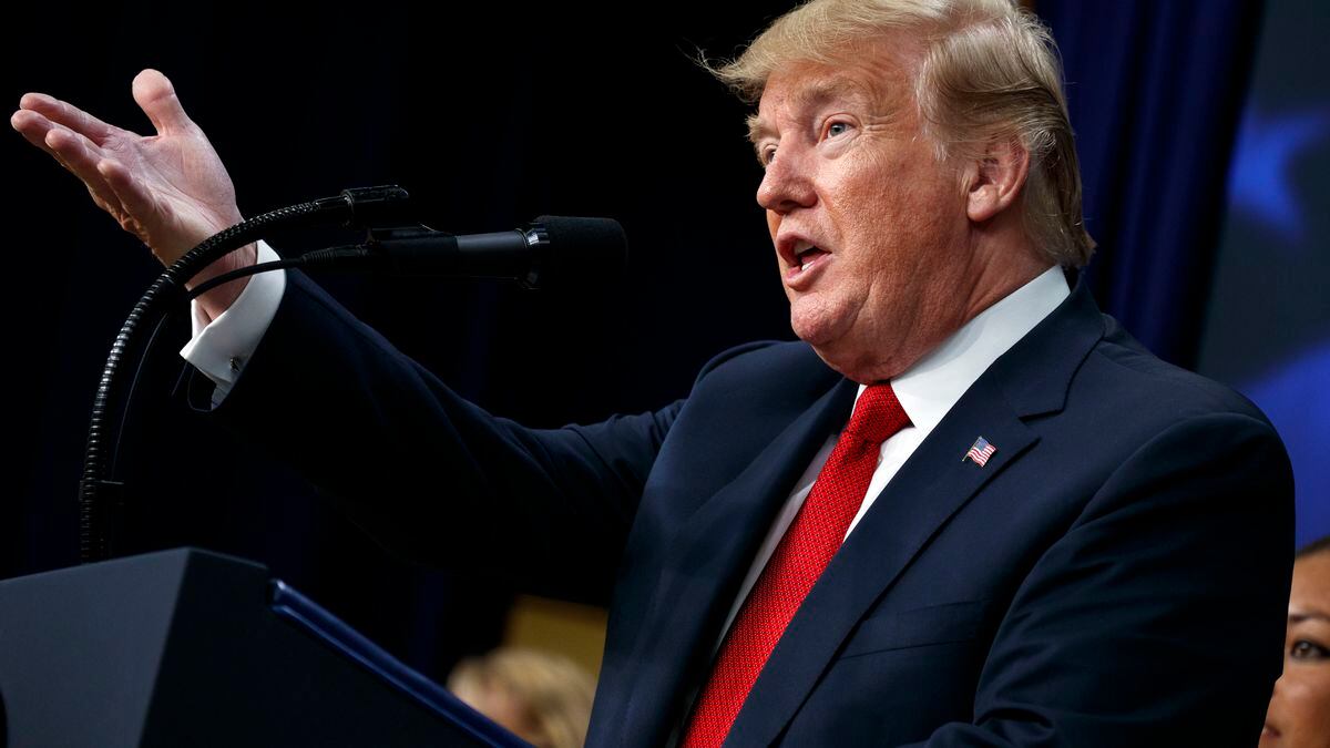 In this June 22, 2018 photo, President Donald Trump speaks about immigration alongside family...