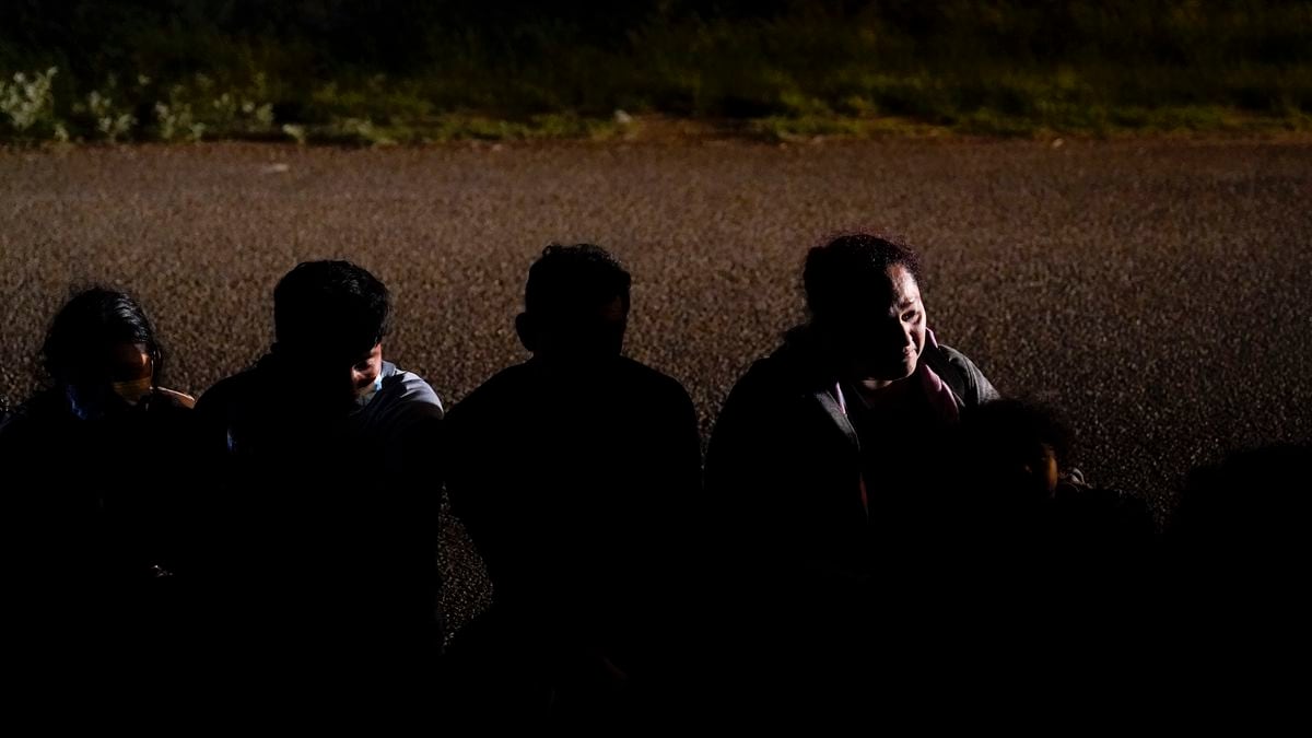 FILE - In this Monday, May 17, 2021, file photo, a group of migrants, mainly from Honduras and...