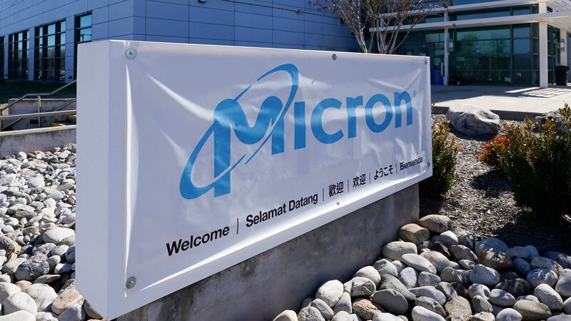 FILE - A sign marks the entrance of the Micron Technology automotive chip manufacturing plant...