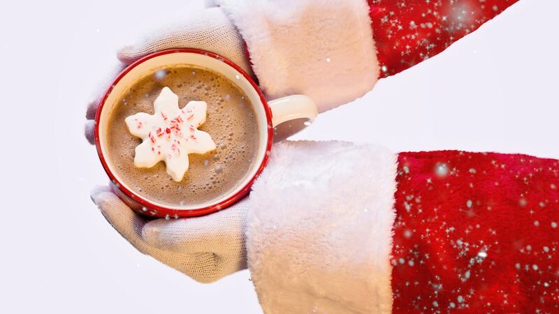 Santa's hands and a cup of hot coco.