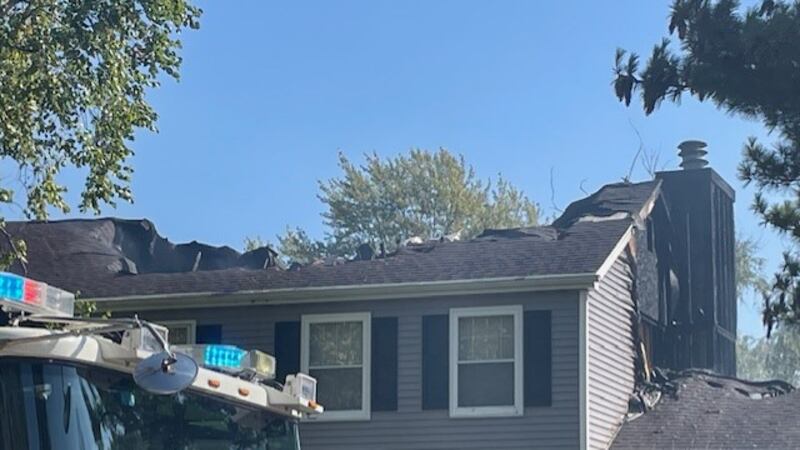 Residents got out of the house along with the family dog before part of the home's roof...