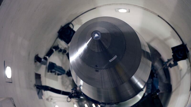 FILE - An inert Minuteman III missile is seen in a training launch tube at Minot Air Force...