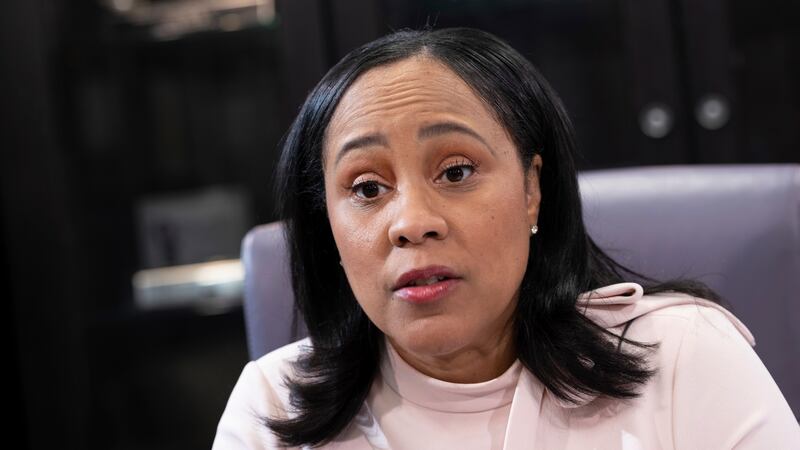 FILE - Fulton County District Attorney Fani Willis is photographed in her office on Tuesday,...