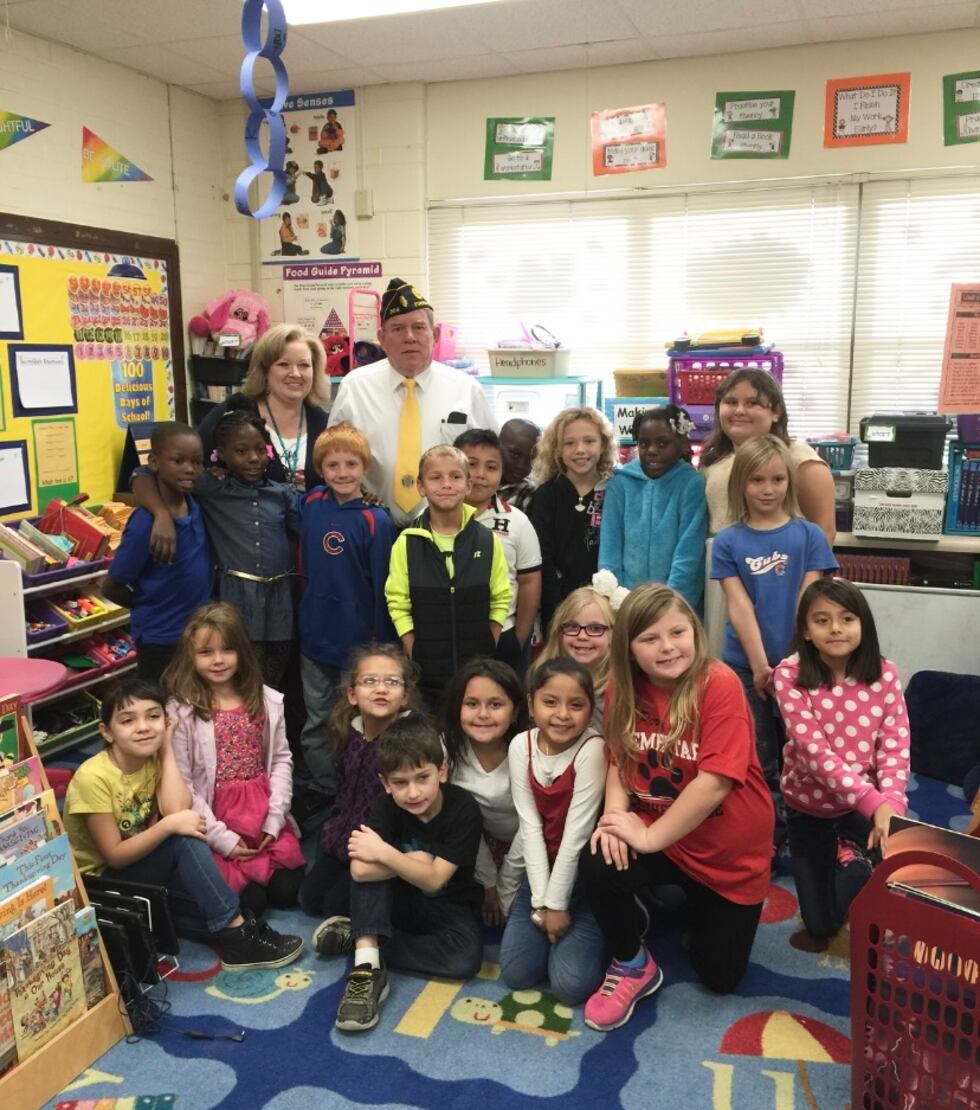Photo of Vicki Lake with her classroom.